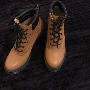 Doc Martens. Leather construction boots.